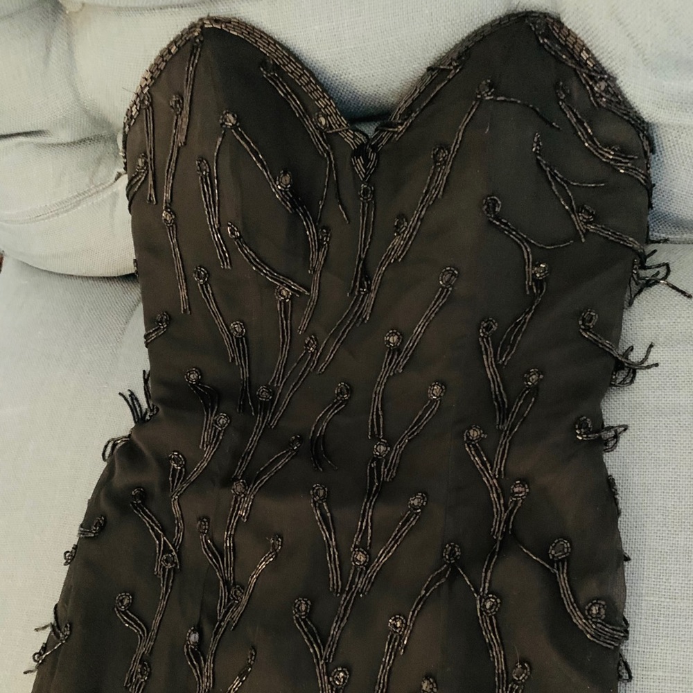 Black strapless “sweetheart” beaded tassel dress